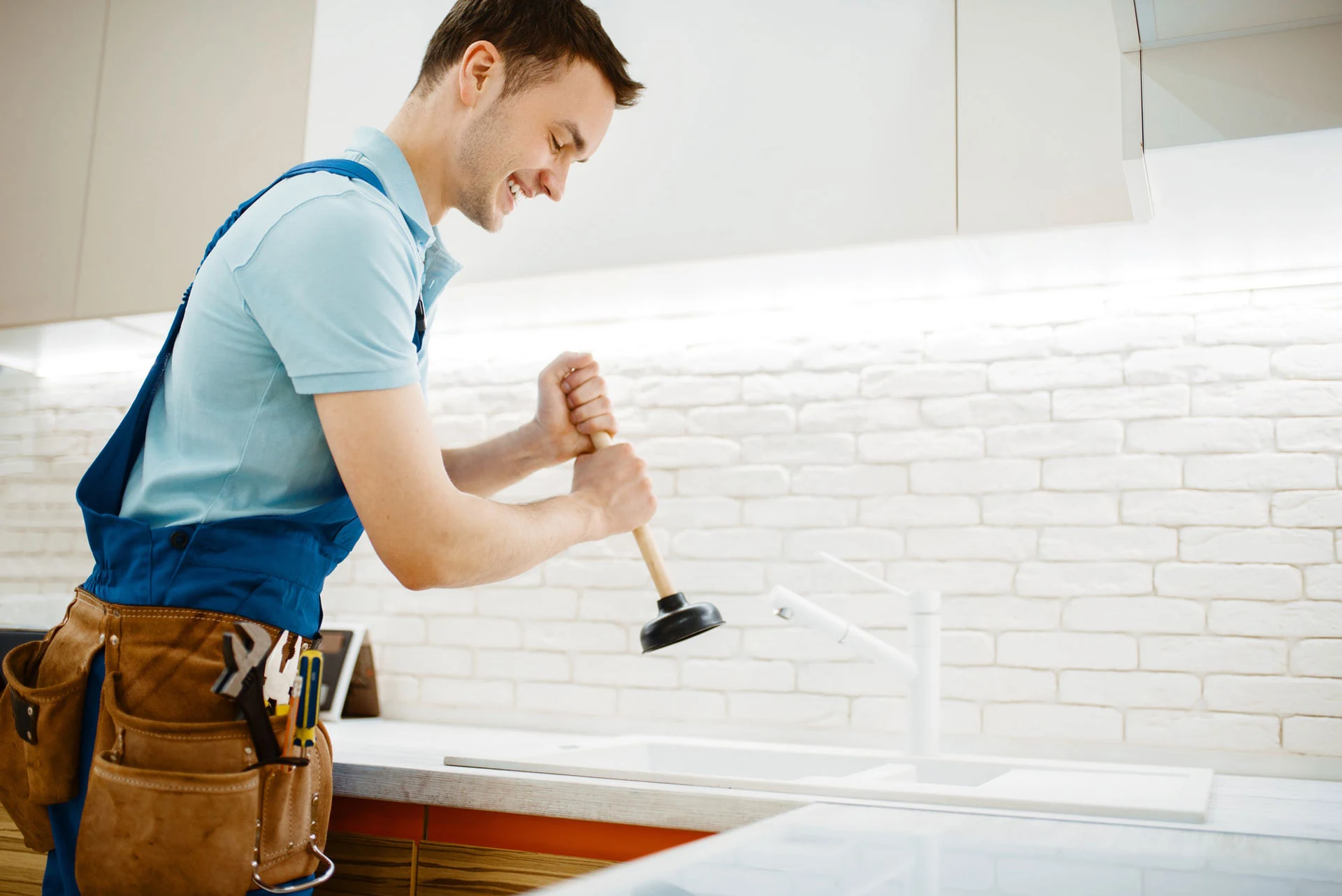 MK Heating engineer attending a plumbing repair